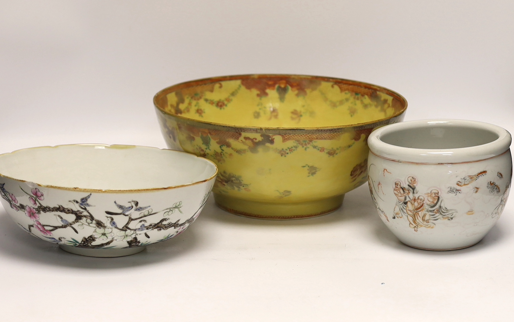 Two Chinese famille rose bowls and a small jardiniere